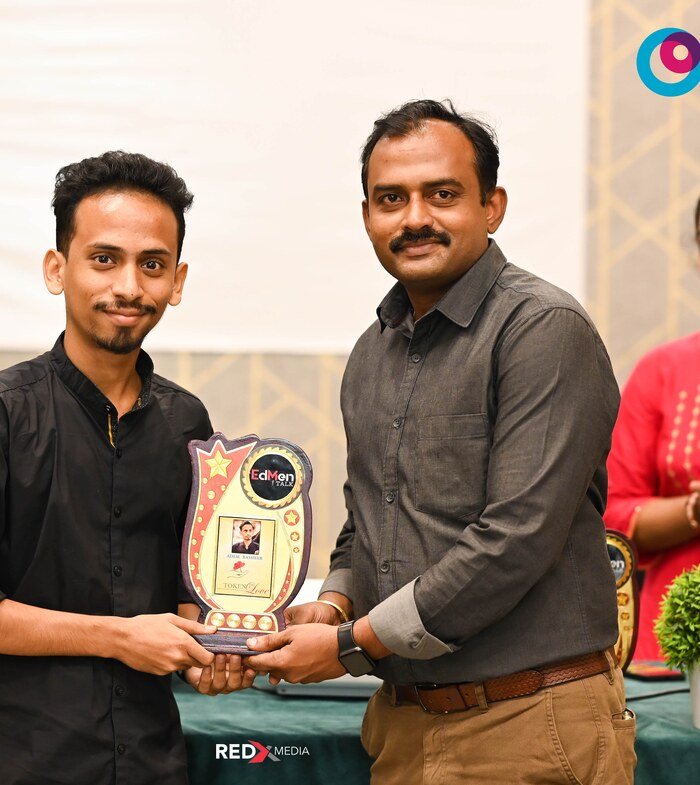 Ajmal Basheer receiving a Token of Love award at EdMen Talk, Forum Center